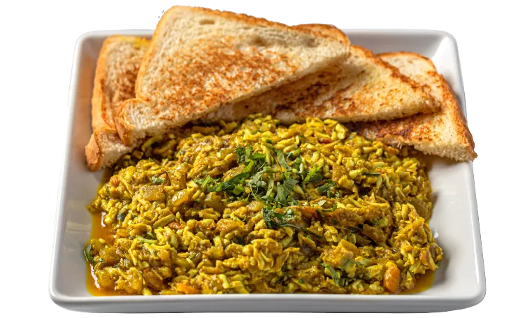 Boiled Kheemo - shredded boiled eggs cooked with Indian spices and vegetables, also known as desi kheemo